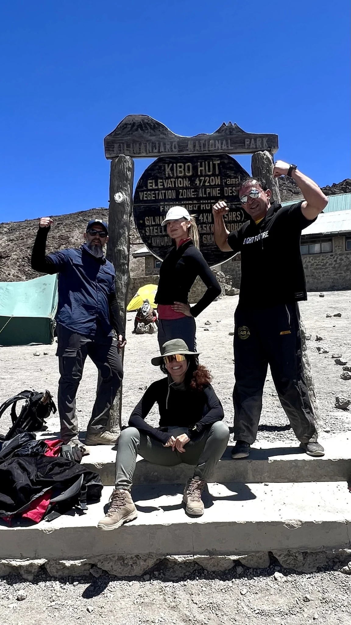 Marissa and the expedition group celebrating at Kibo Hut on Kilimanjaro
